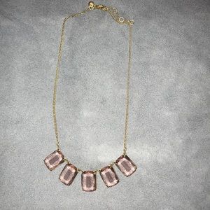 Gold statement necklace.